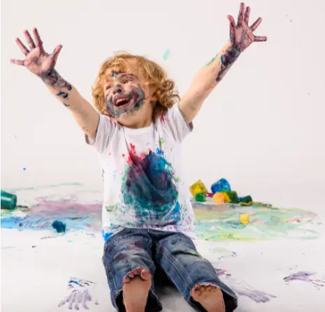 Messy Toddlers playing with paint