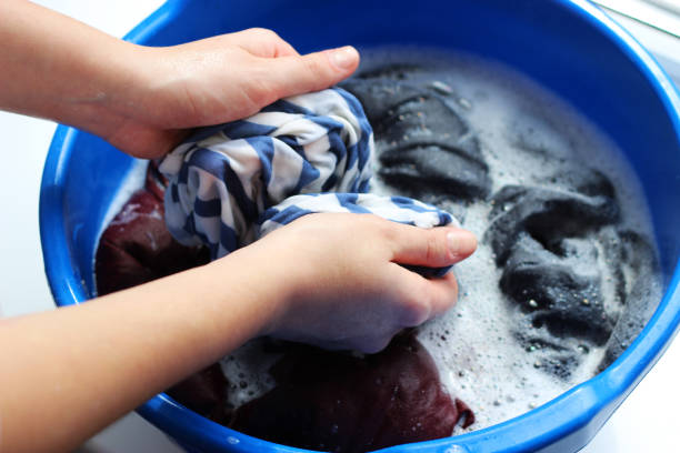Handwashing clothes, teaching kids life skills through chores